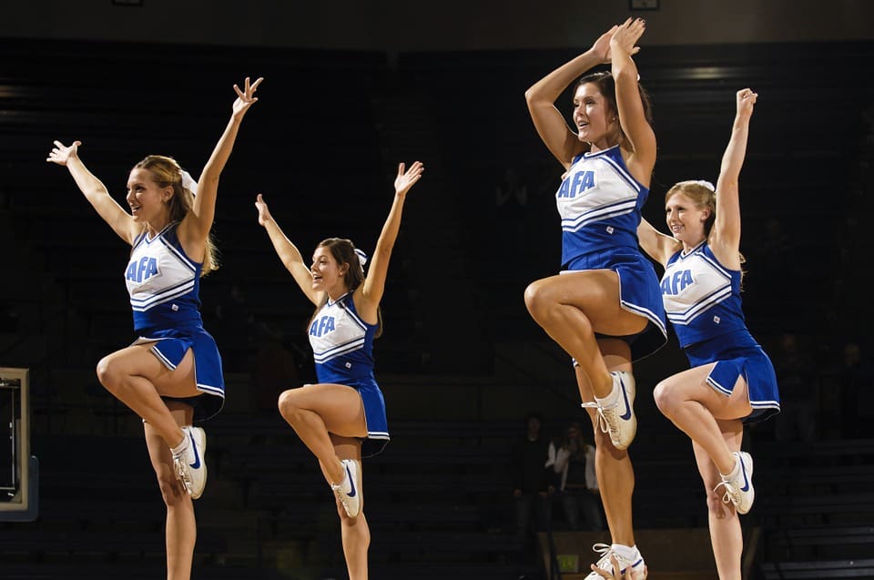 Cheerleader girls with Athletic Uniform