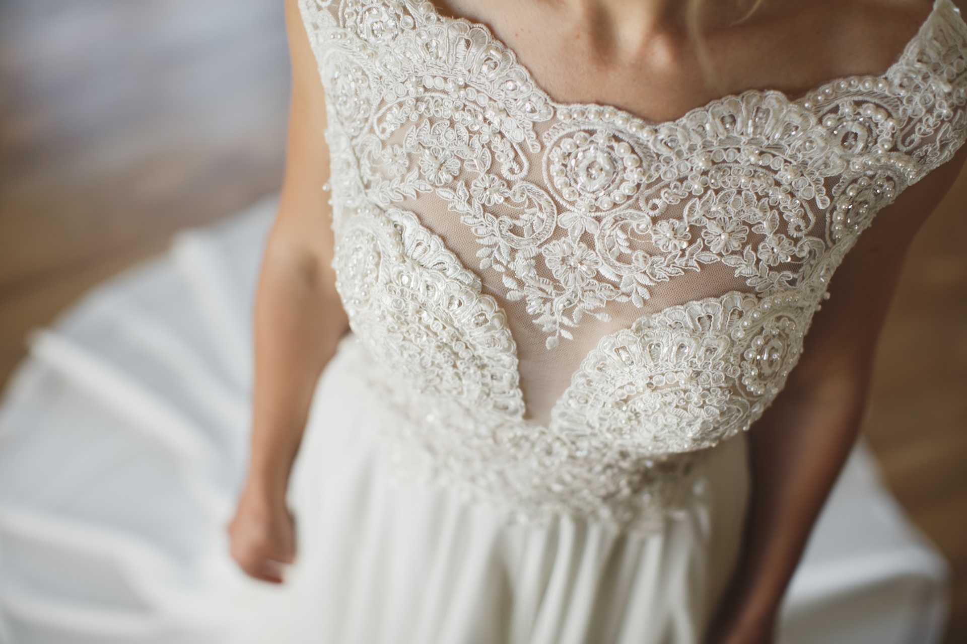 The bride in the dress.